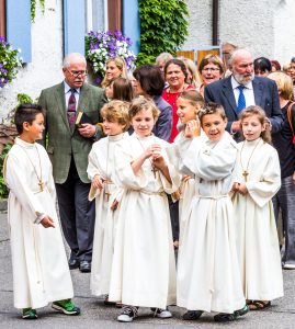 children in altar server garments